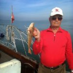 Captain Igloo® - pescatore durante sessione di pesca sportiva con Captain Igloo®